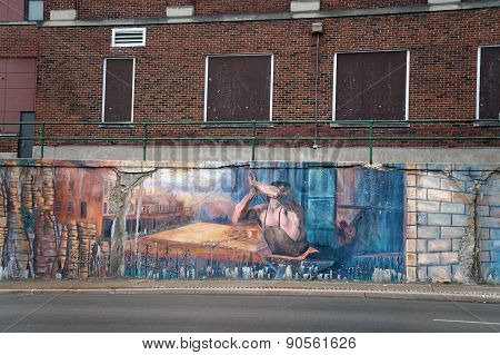 Boarded Windows Behind a Mural