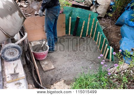 Man Building Artificial Pond