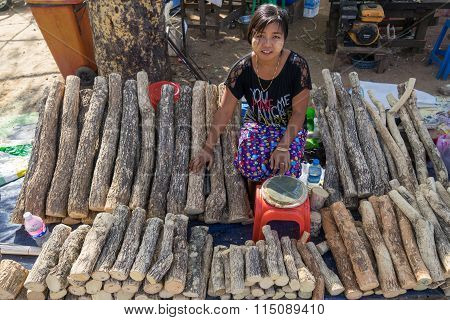 Young Myanmar girls with thanaka in her shop