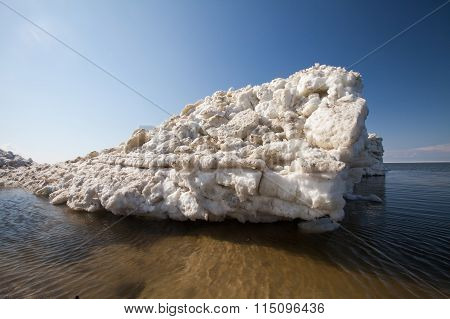 Ice Hummocks Swim In The Sea