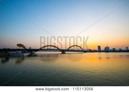 Dragon River Bridge ( Rong Bridge) in sunset in Da Nang, Vietnam.