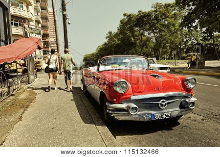 CUBA, HAVANA-JUNE 27, 2015: Classic american car on a street in Havana. Cubans use the retro cars as