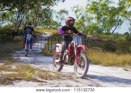 Off-road motorcycle riders trains in the Tg Kubung, Labuan.