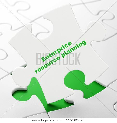 Business concept: Enterprice Resource Planning on puzzle background