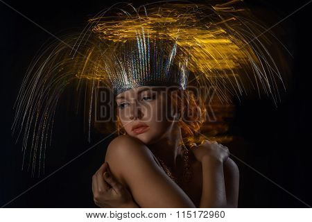 portrait of topless girl in a mixed light