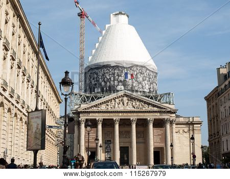 PARIS, FRANCE - SEPTEMBER 8, 2014: Paris - The Pantheon against the background of repaired dome. Construction of the building started in 1757 and was finished in 1791