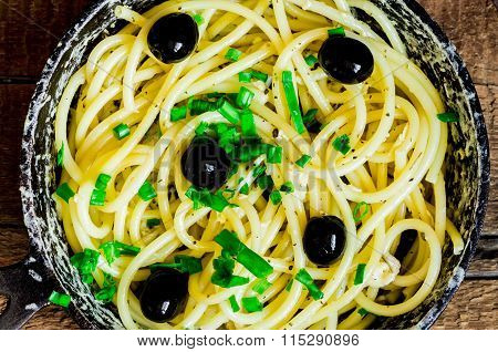 Bucatini Pasta With Egg And Leek And Olives