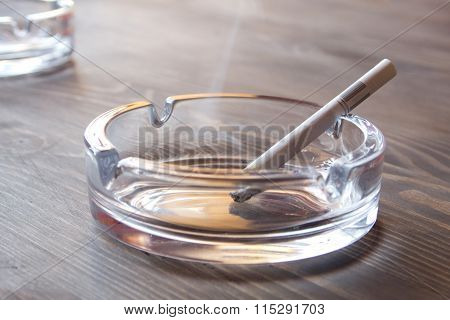 The cigarette in an ashtray