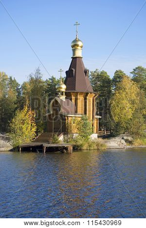 The wooden Church of the Apostle Andrew on Vuoksa autumn day. Leningrad region