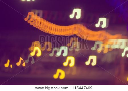 Blurring Lights Bokeh Background Of Music Notes