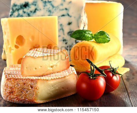 Different Sorts Of Cheese On Kitchen Table