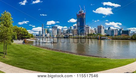 BRISBANE, AUS - NOV 18 2015: River walk in South Bank Parkland. It's inner-city man-made beach next to city center.