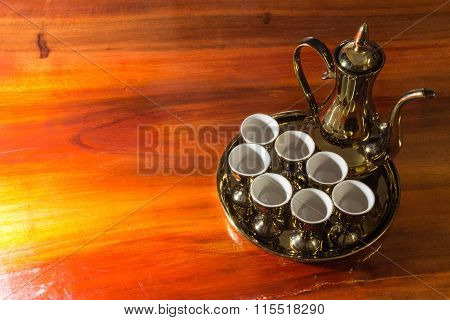 tea pot close up on wood floor