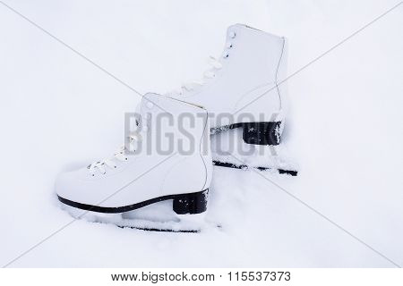 Figure Skates In Snow Close-up
