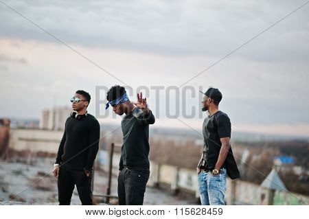 Three Rap Singers Band On The Roof