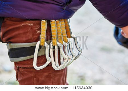 quick-draws on the  climber's harness