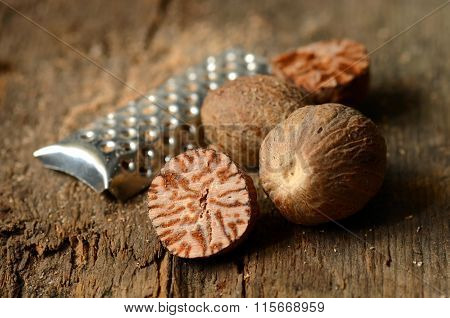 Nutmeg On Wooden Table