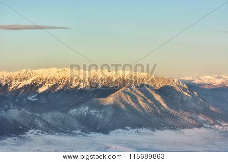 Winter Story. Sunrise At The Top Of Postavarul Mountain. Brasov Romania. Low Key, Dark Background, S