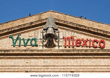 Building Facade With Viva Mexico