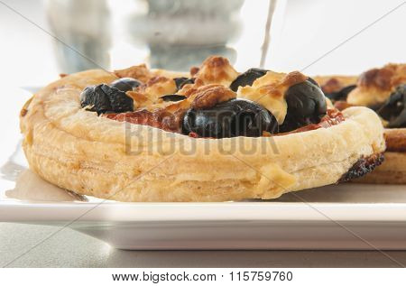 mini pizza close up on white background