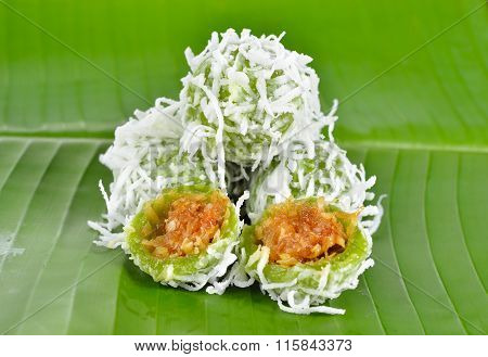 Thai Dessert, Sweet Boiled Ball Dessert With Shredded Coconut On Banana Leaf