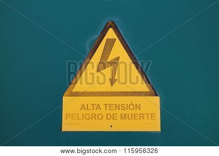 High Voltage Sign and Spanish Warning