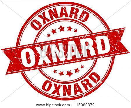 Oxnard red round grunge vintage ribbon stamp