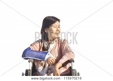 Asian Senior Woman With Broken Wrist On Wheel Chair