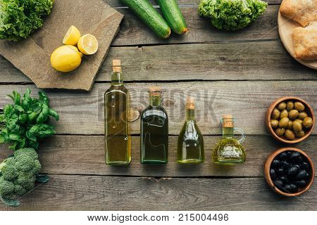 Olive Bottles On Table