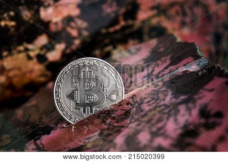 Silver bitcoin in the gem stone. Bitcoin cryptocurrency.
