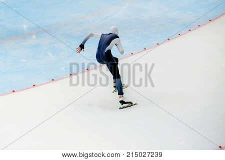 sprint race male athlete speed skater skate turn