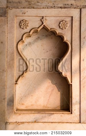 Architectural detail immitating window inside Red Fort of Agra, India. Background pattern
