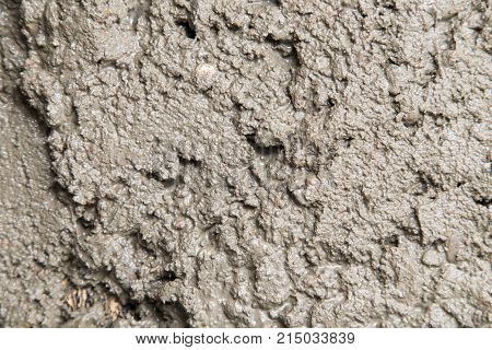 Background of the fresh cement solution . Photo of an abstract texture