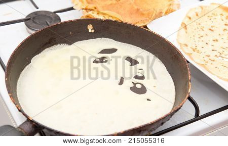 pancakes in a frying pan . Photos in the studio