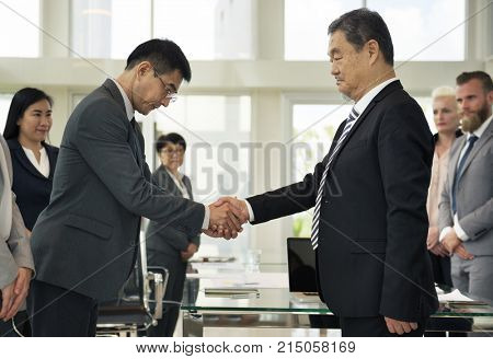 Business Partners Introductionary Handshake Bow