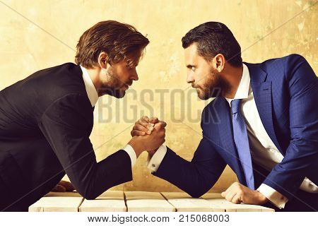 Rivalry Concept. Businessmen Arm Wrestling.