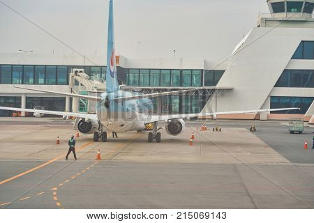 BUSAN, SOUTH KOREA - CIRCA MAY, 2017: aircraft stand on the tarmac at Gimhae International Airport.