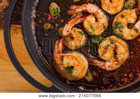 fresh shrimps casserole served with hot spices