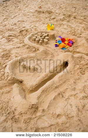 Speelgoed op het zand