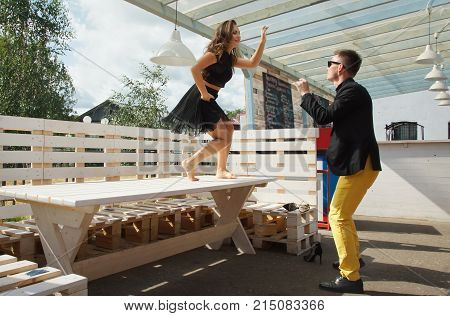 Couple Of Dancers Dancing Bachata On A City Street