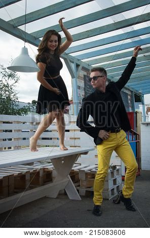 Couple Of Dancers Dancing Bachata On A City Street