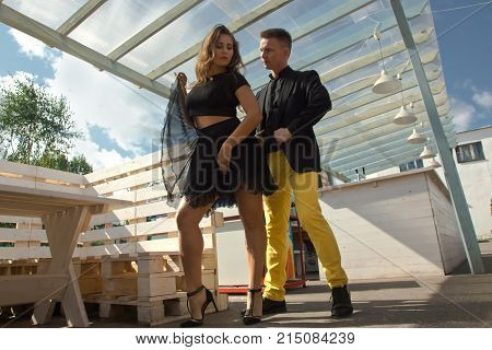 Couple Of Dancers Dancing Bachata On A City Street
