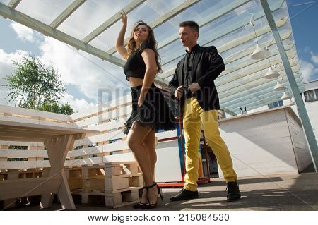 Couple Of Dancers Dancing Bachata On A City Street