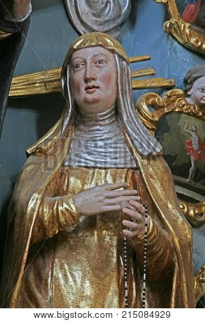 BELEC, CROATIA - NOVEMBER 17: Saint Clare statue on the altar in the Baroque Church of Our Lady of the Snow in Belec, Croatia on November 17, 2011.