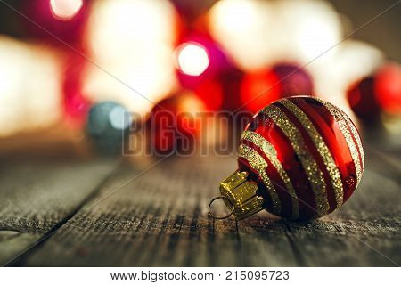 Christmas Bauble On Rustic Wooden Board