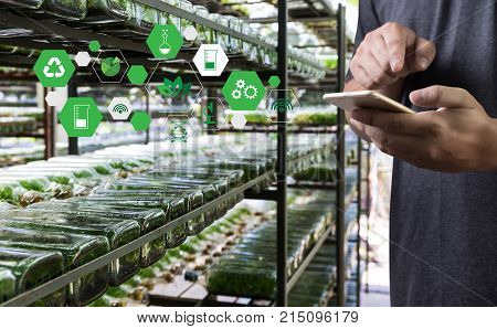 Agriculture Technology Concept Man Agronomist Using A Tablet Internet Of Things  Report