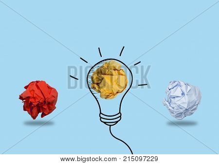 Creativity inspiration,ideas concepts with lightbulb and paper crumpled ball on  color blue background