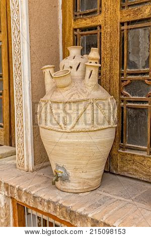 An old urn, decorative detail of the Zoroastrian fire temple Atash Behram in Yazd Iran.