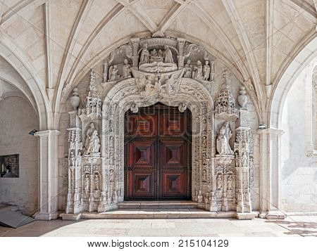 Lisbon, Portugal - October 31, 2016: West Portal of Jeronimos Monastery or Abbey that works as entrance to the church. UNESCO World Heritage Site stands as the best example of the Gothic Manueline art