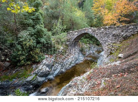Famous ancient venetian stone bridge of Elia at Troodos mountains Cyprus
